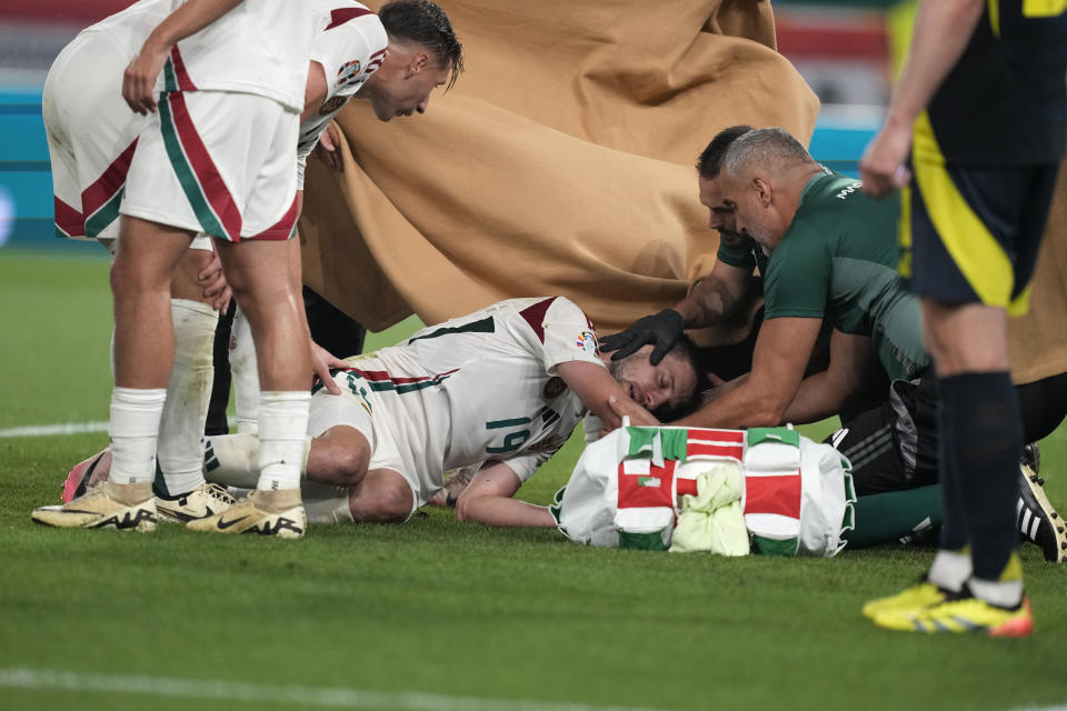 The Hungarian striker fell hard on his neck (AP Photo/Antonio Calanni)