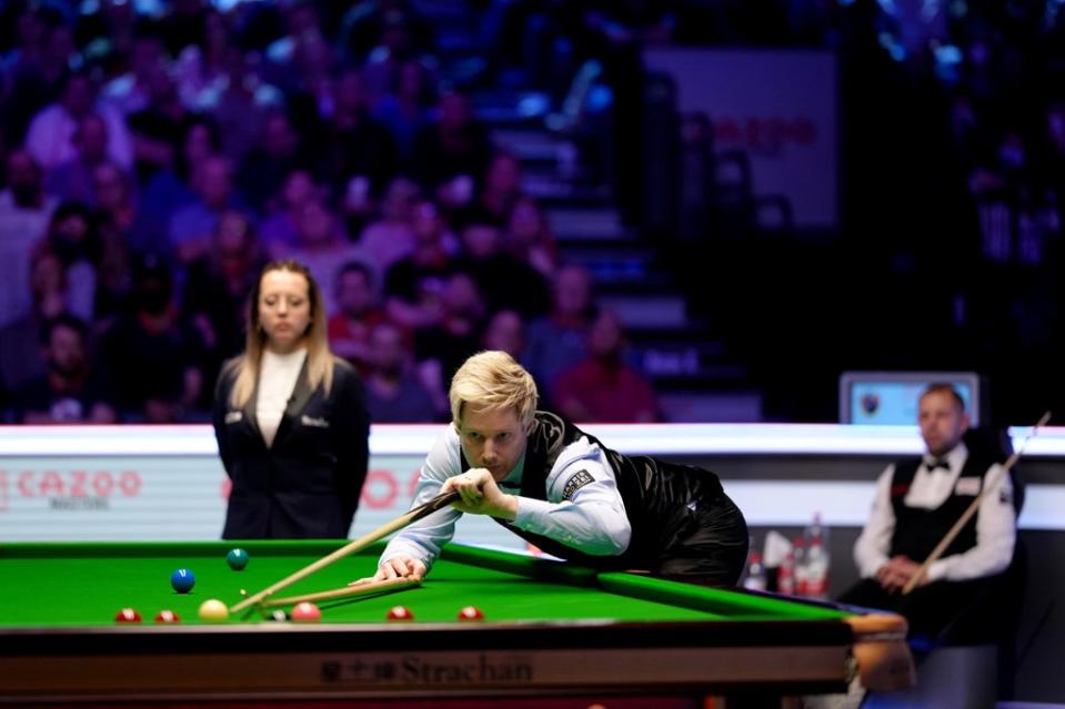 Neil Robertson at the table as opponent Barry Hawkins watches on in their Alexandra Palace final (John Walton/PA) (PA Wire)