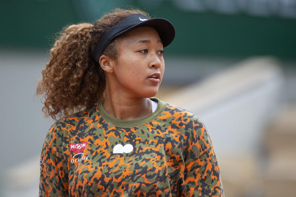 PARIS, FRANCE May 26. Naomi Osaka of Japan during practice on Court Philippe-Chatrier during a practice match against Ashleigh Barty of Australia  in preparation for the 2021 French Open Tennis Tournament at Roland Garros on May 2pm 6th 2021 in Paris, France. (Photo by Tim Clayton/Corbis via Getty Images)