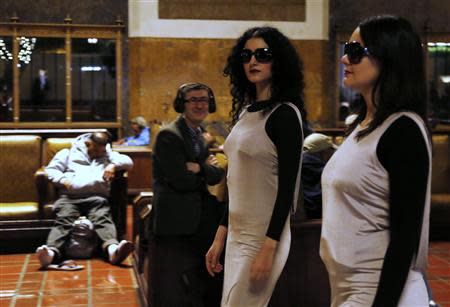 Members of the L.A. Dance Project perform the opera "Invisible Cities" at the Amtrak's Union Station in Los Angeles November 15, 2013. REUTERS/Fred Prouser