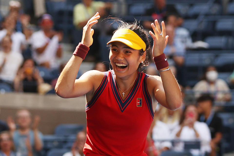 Pictured here, Britain's Emma Raducanu reacts after beating Belinda Bencic in the US Open quarter-finals. 