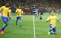 Football Soccer - Brazil v Paraguay - World Cup 2018 Qualifiers - Arena Corinthians stadium, Sao Paulo, Brazil - 28/3/17 - Brazil's Philippe Coutinho (R) celebrates his goal with his teammates. REUTERS/Nacho Doce