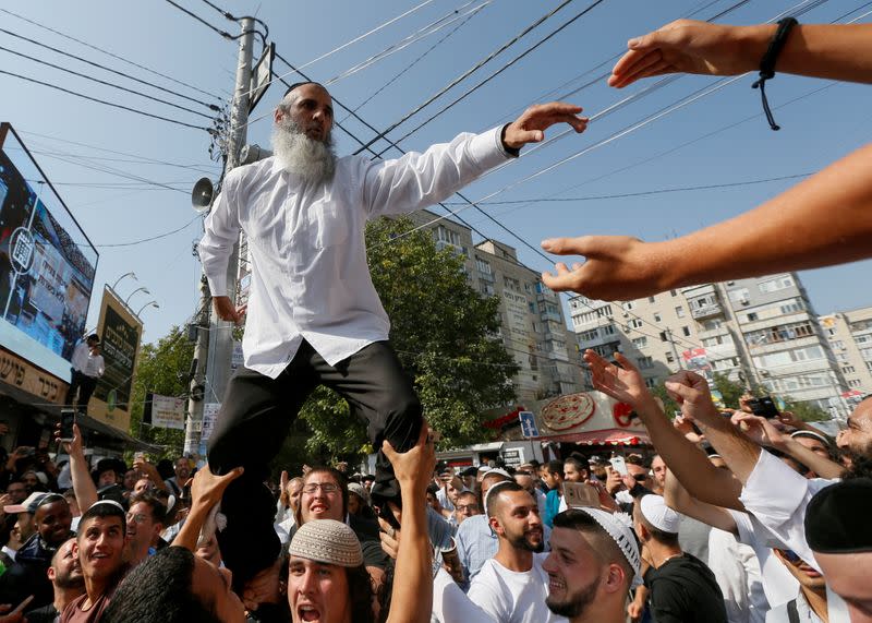 FILE PHOTO: Ultra-Orthodox Jewish pilgrims celebrate Rosh Hashanah holiday near the tomb of Rabbi Nachman of Breslov in the town of Uman