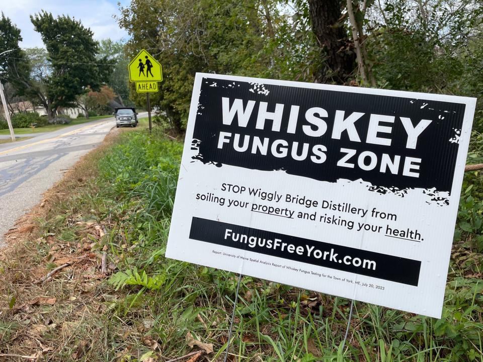 A sign on Organug Road near the middle school tries to persuade people to stop Wiggly Bridge Distillery from expanding in York.