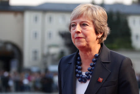 Britain's Prime Minister Theresa May talks to the media as she arrives for the informal meeting of European Union leaders ahead of the EU summit, in Salzburg, Austria, September 19, 2018. REUTERS/Lisi Niesner