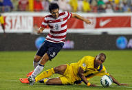 TAMPA, FL - JUNE 08: Forward Herculez Gomez #9 of Team USA battles defender Marc Joseph #5 of Team Antigua and Barbuda for the ball during the FIFA World Cup Qualifier Match at Raymond James Stadium on June 8, 2012 in Tampa, Florida. (Photo by J. Meric/Getty Images)