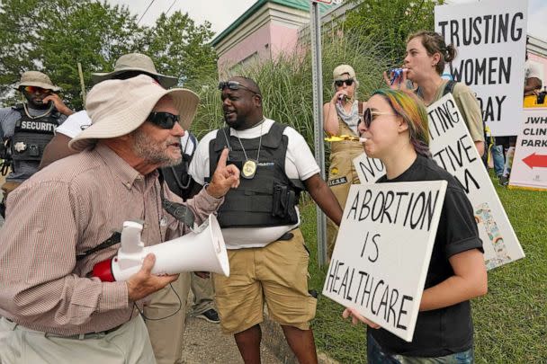 PHOTO: Abortion rights supporters use noisemakers to drown out the sound of an anti-abortion activists' bullhorn, outside the Jackson Women's Health Organization clinic in Jackson, Miss., July 6, 2022.  (Rogelio V. Solis/AP)