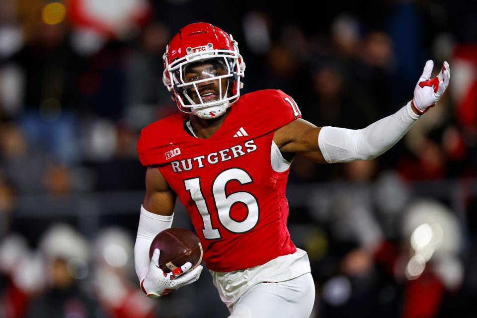 Defensive back Max Melton of Rutgers celebrates a November interception against Maryland. [Rich Schultz/Getty Images]