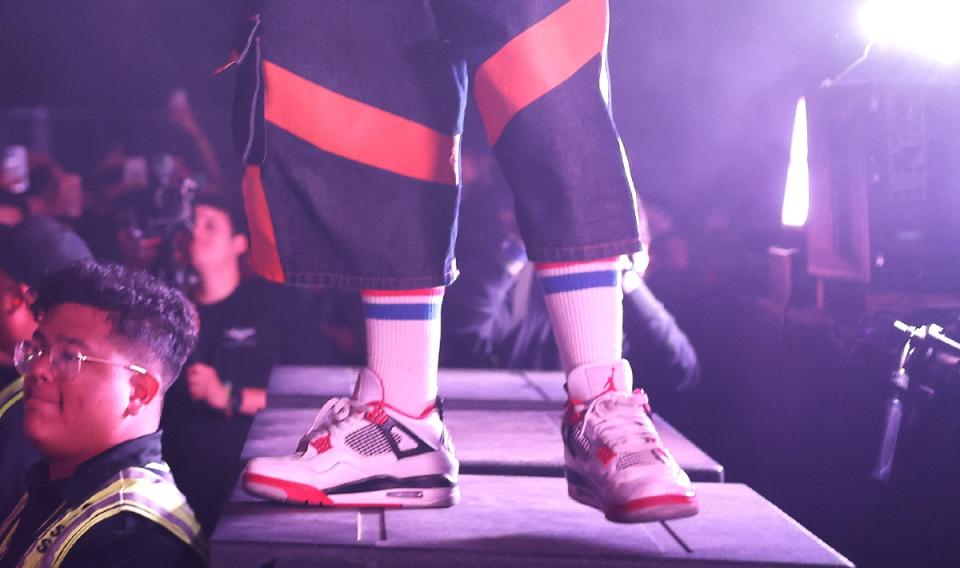 Close up of Billie Eilish' performs at Coachella's Air Jordan 4 Retro sneakers