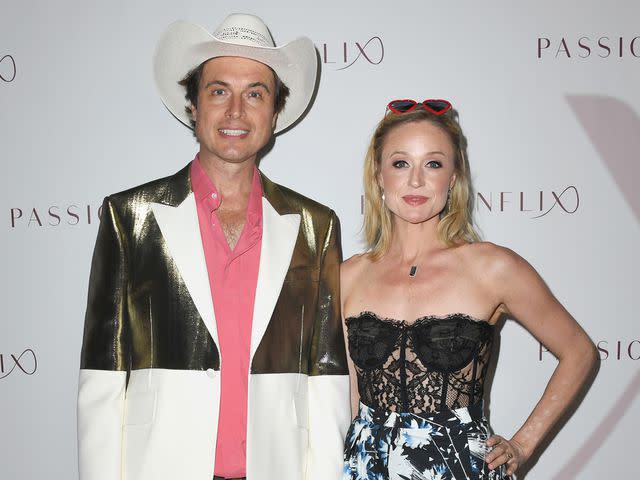 <p>Jon Kopaloff/Getty</p> Kimbal Musk and wife Christiana at the season 2 premiere of Passionflix's 'Driven' in July 2021.