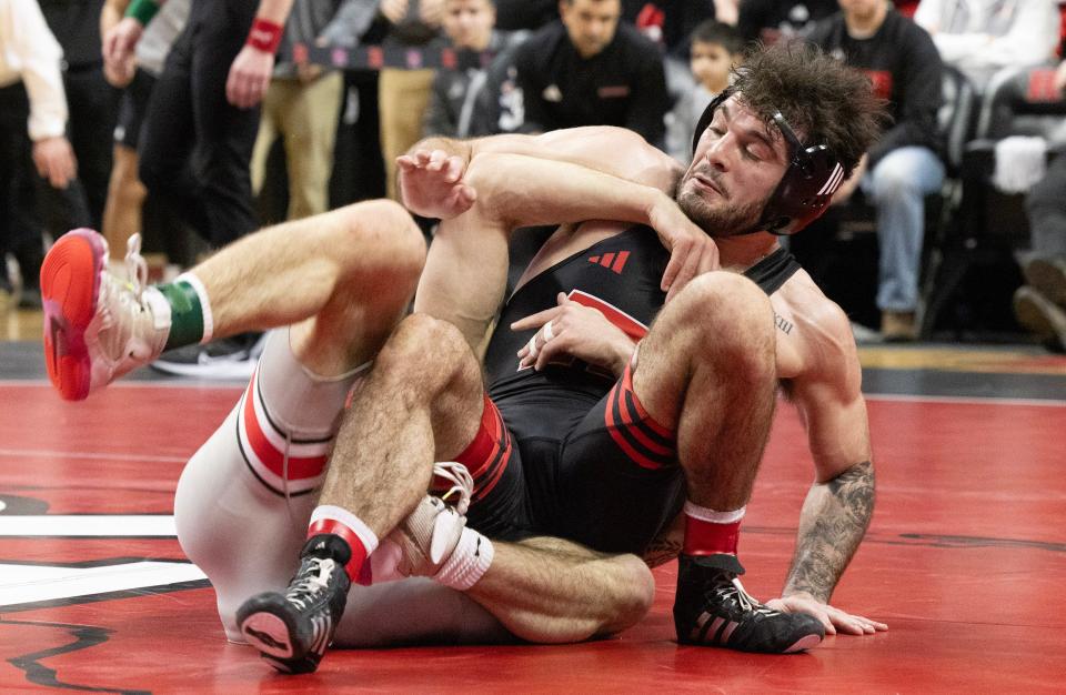 Rutgers' Michael Cetta (right) recorded a 12-9 win over Ohio State's returning All-American Dylan D'Emilio Sunday.