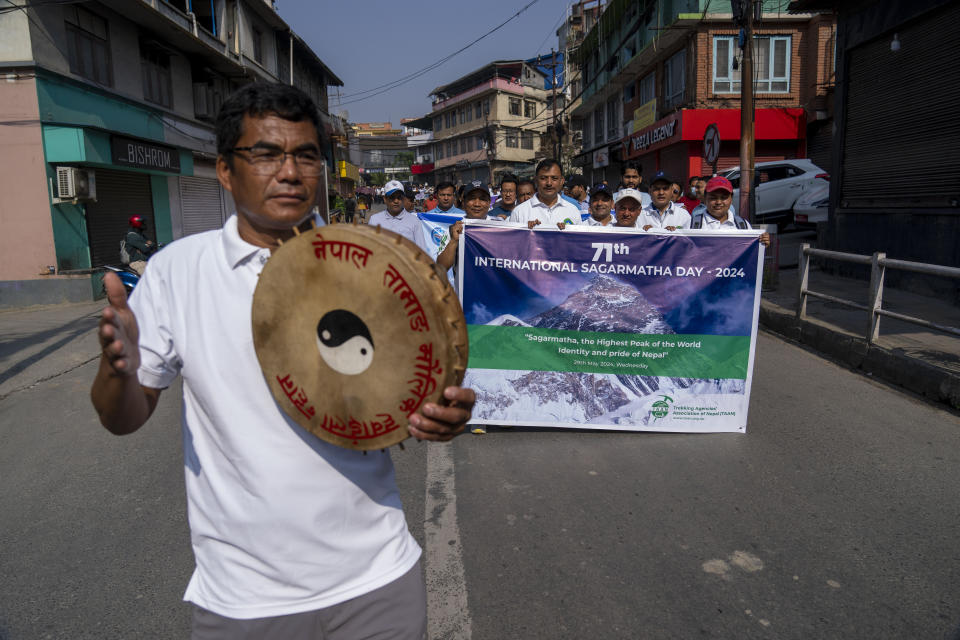 People from the mountaineering community participate in a rally to mark the anniversary of the first ascent of Mount Everest in Kathmandu, Nepal, Wednesday, May 29, 2024. (AP Photo/Niranjan Shrestha)