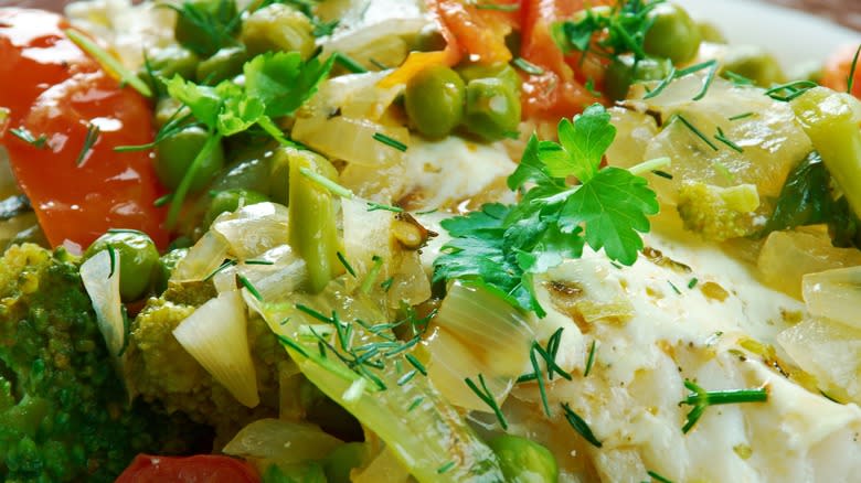 Closeup of fish and mixed vegetables 