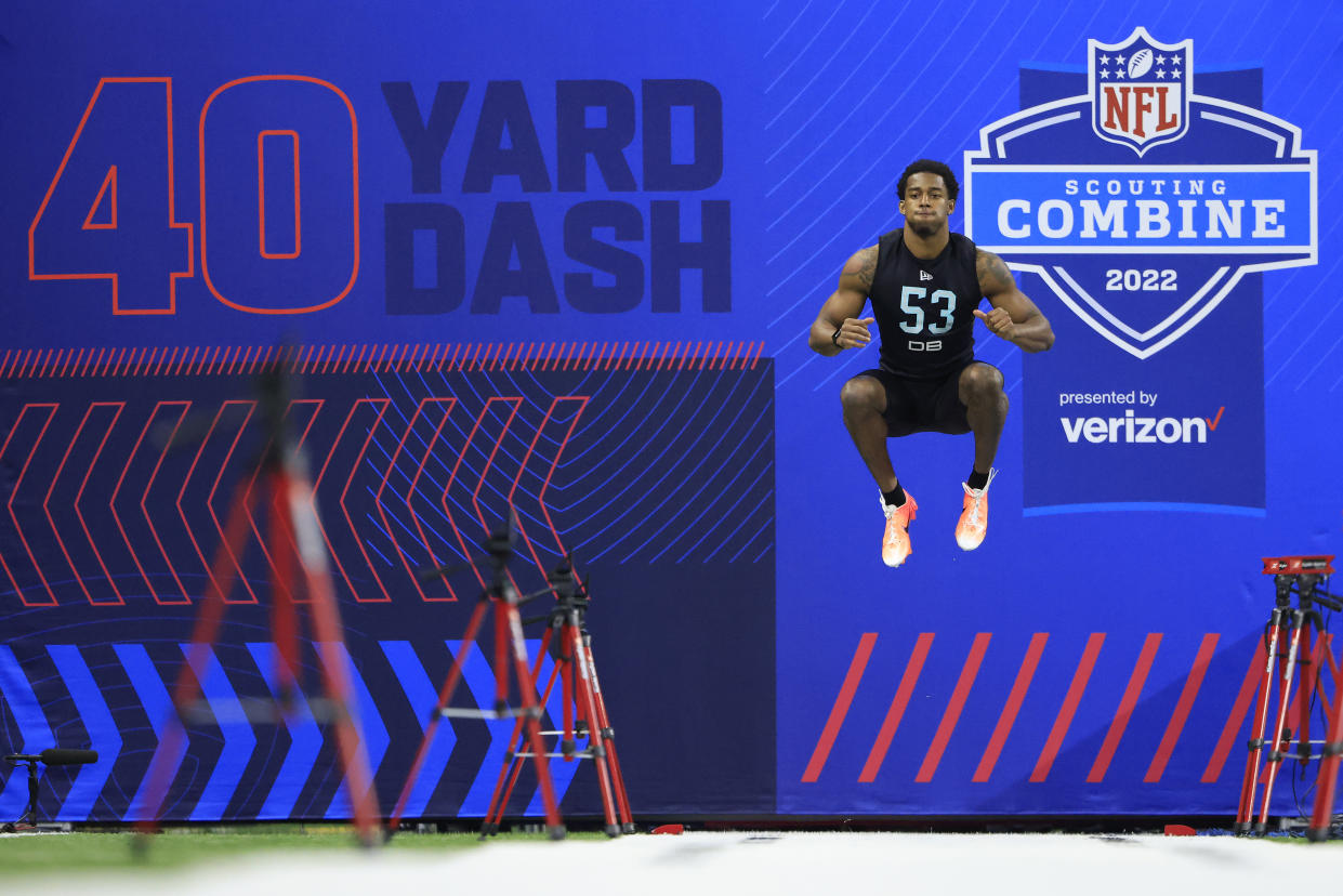 INDIANAPOLIS, INDIANA - MARCH 06: Dax Hill #DB53 of the Michigan Wolverines runs the 40 yard dash during the NFL Combine at Lucas Oil Stadium on March 06, 2022 in Indianapolis, Indiana. (Photo by Justin Casterline/Getty Images)