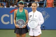 Aug 5, 2018; Washington, DC, USA; Donna Vekic of Croatia (L) and Svetlana Kuznetsova of Russia (R) hold the runner-up and Donald Dell Championship Trophy (respectively) after their match in the women's singles final in the Citi Open at Rock Creek Park Tennis Center. Kuznetsova won 4-6, 7-6(7), 6-2. Mandatory Credit: Geoff Burke-USA TODAY Sports