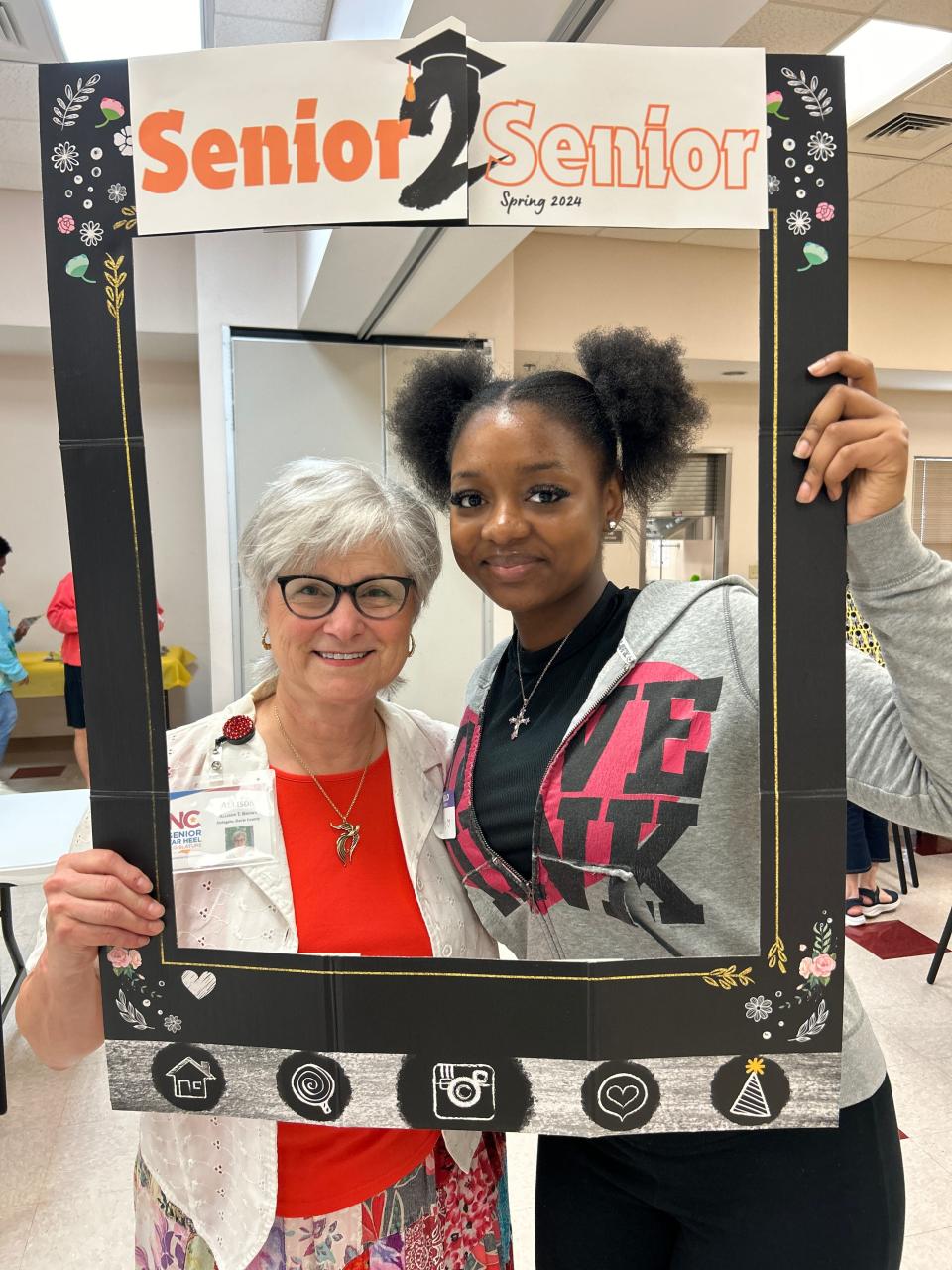 Allison Brown (left) and Brianna Covington (right), a senior at Davie County High School. The pair met as part of a pen pal program created by Covington's English teacher, Ashley Snider.