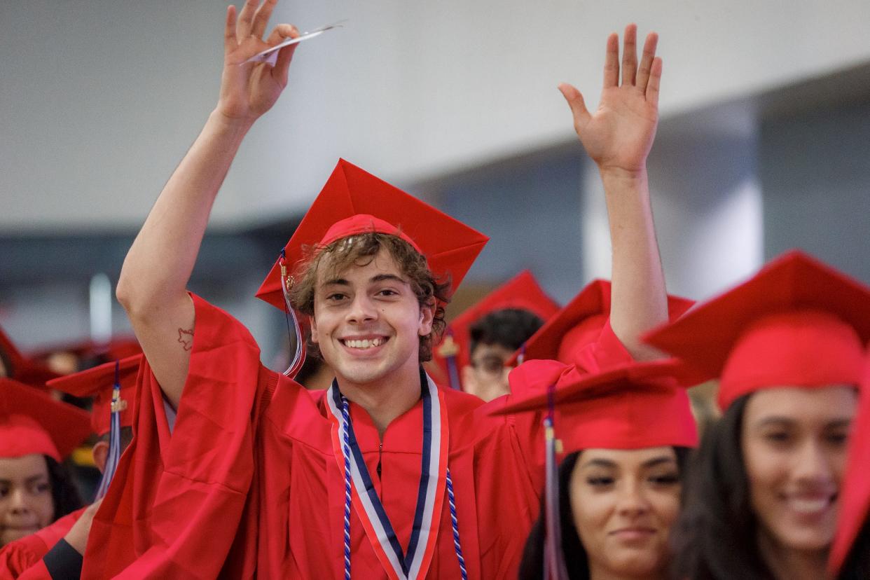 Forest Hill Community High School graduates attend ceremonies at the South Florida Fairgrounds and Expo Center in unincorporated Palm Beach County, Fla., on May 23, 2023.
