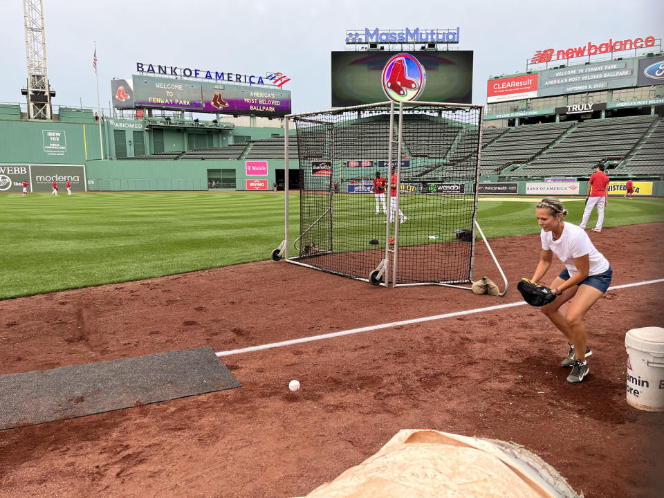 Dylan Dreyer practices catching a ball before putting her skills to the test during a Boston Red Sox game. (Erin Kim / TODAY)