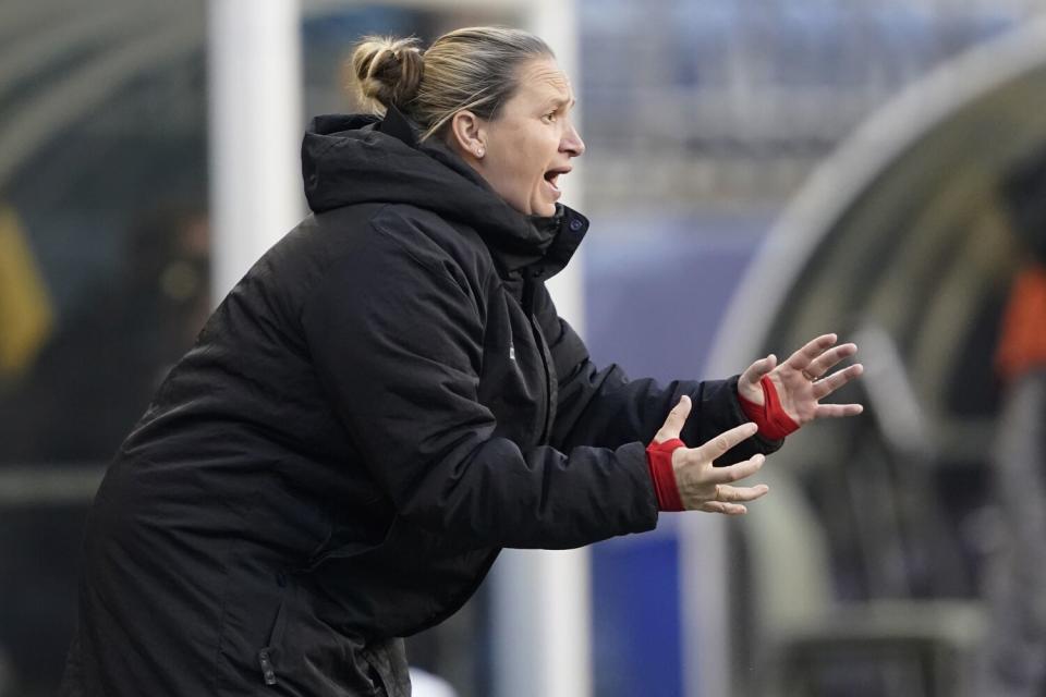 OL Reign coach Laura Harvey directs her team from the sideline during a match against the San Diego Wave