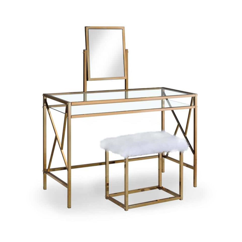 <p><a href="https://clicks.trx-hub.com/xid/hearstcorp_9eb67_clg?q=https%3A%2F%2Fwww.homedepot.com%2Fp%2FFurniture-of-America-Helaine-Contemporary-2-Piece-in-Champagne-Metal-Vanity-and-Stool-Set-IDF-DK6707CPN%2F310782718&p=https%3A%2F%2Fwww.countryliving.com%2Fhome-design%2Fdecorating-ideas%2Fg44785354%2Fbest-makeup-vanity%2F&utmSource=yahoo-us&utmCampaign=55&utmMedium=syn" rel="nofollow noopener" target="_blank" data-ylk="slk:Shop Now;elm:context_link;itc:0;sec:content-canvas" class="link ">Shop Now</a></p><p>2-Piece Vanity and Stool Set</p><p>homedepot.com</p><p>$273.76</p>