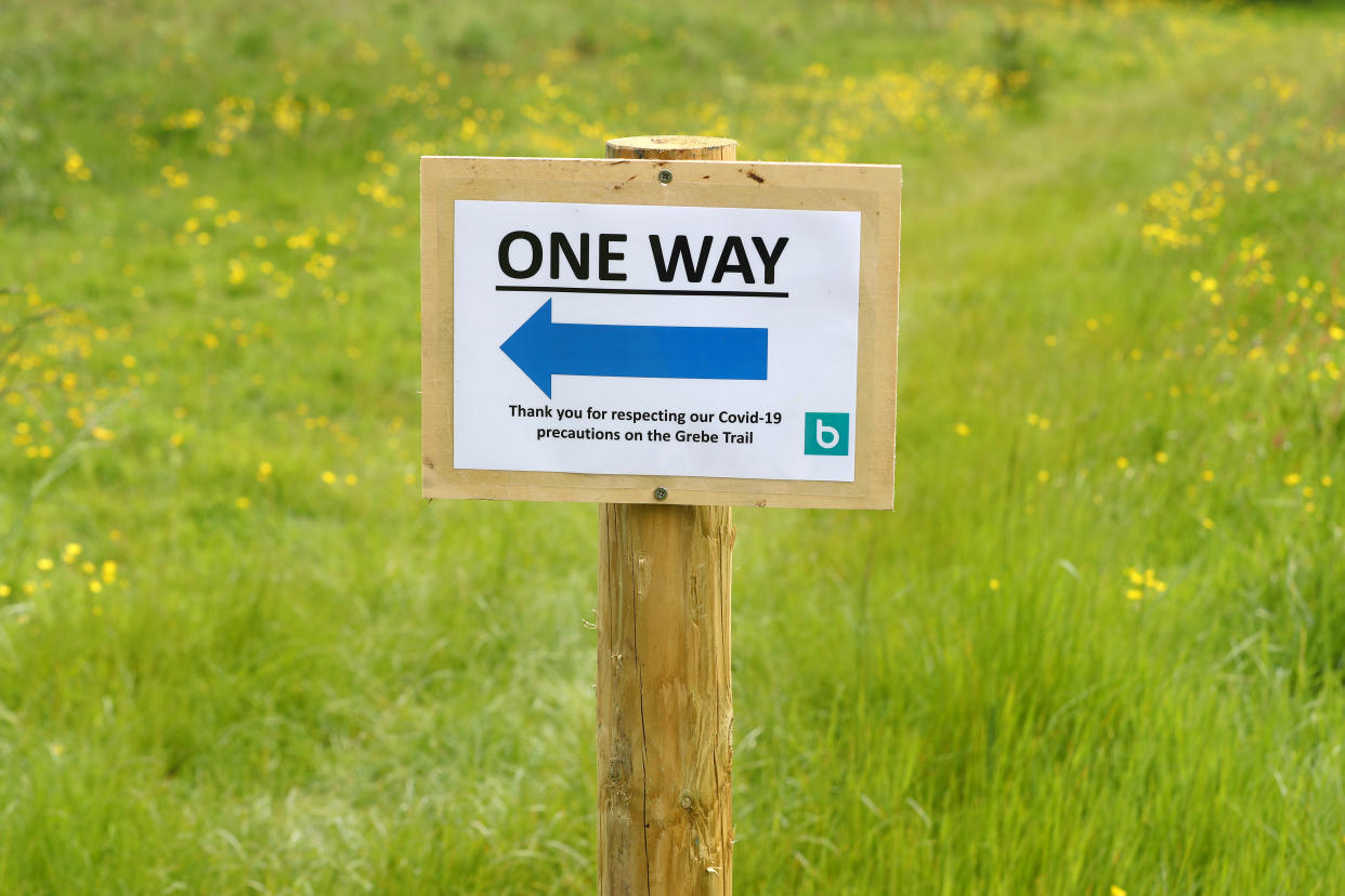 CHEW MAGNA,  - MAY 13: One way signs on the Grebe Trail on May 13, 2020 in Chew Valley Lake, Somerset, England. The prime minister announced the general contours of a phased exit from the current lockdown, adopted nearly two months ago in an effort curb the spread of Covid-19. (Photo by Michael Steele/Getty Images)