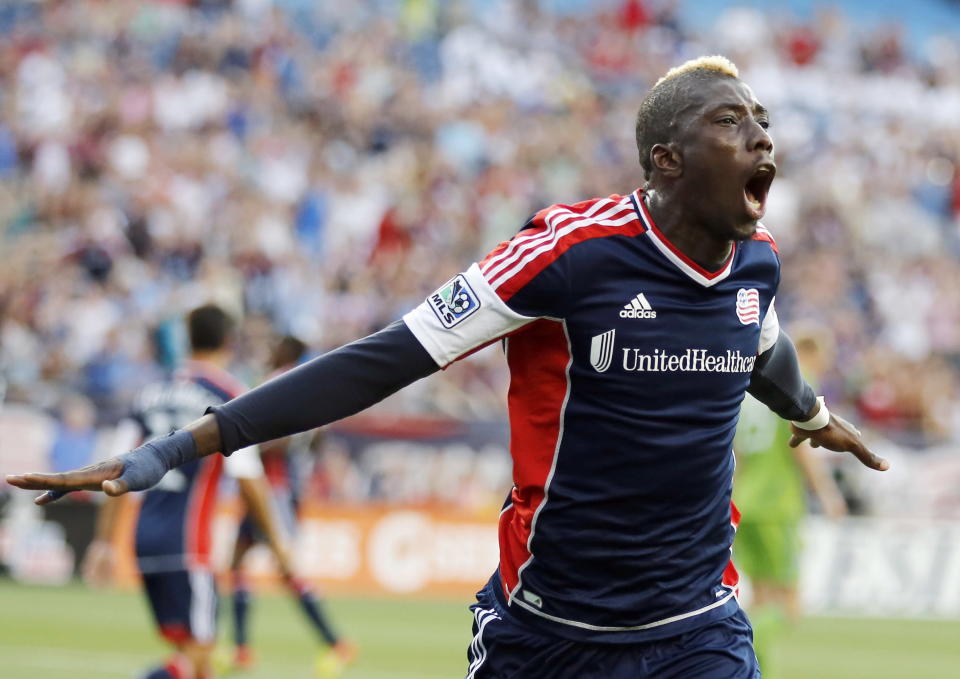 New England Revolution's Saer Sene celebrates his goal in the first half of an MLS soccer game against the Seattle Sounders in Foxborough, Mass., Saturday, June 30, 2012. (AP Photo/Michael Dwyer)