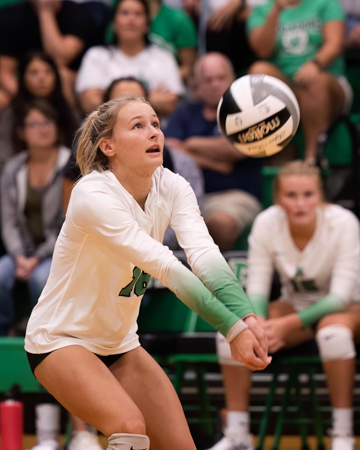 Mogadore's Kenzington Miller hits a return off a serve during a high school volleyball game against the Rootstown Rovers in Mogadore on Tuesday, Sept. 20.