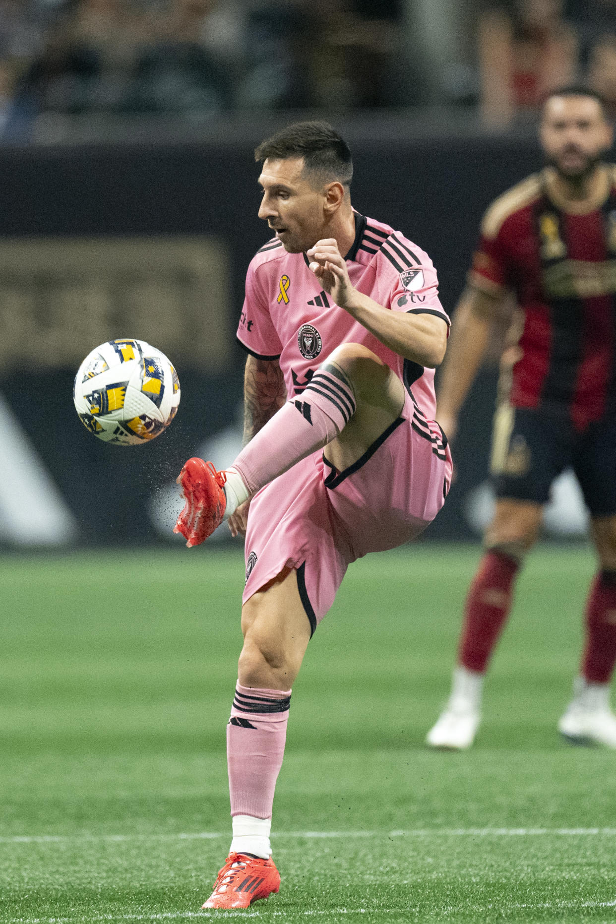 Inter Miami forward Lionel Messi controls the ball during the second half of a MLS soccer match against Atlanta United Wednesday, Sept. 18, 2024. (AP Photo/John Bazemore)