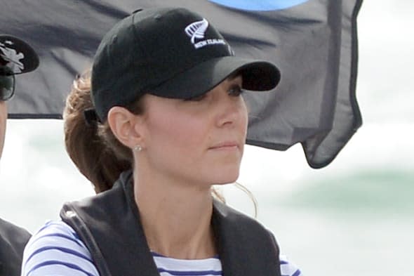 The Duchess of Cambridge steers a yacht as the Duke and Duchess of Cambridge race against each other on two Emirates Team New Zealand Americas Cup yachts as they sail around Auckland Harbour during the fifth day of their official tour to New Zealand. PRESS ASSOCIATION Photo. Picture date: Friday April 11, 2014. Photo credit should read: Anthony Devlin/PA Wire