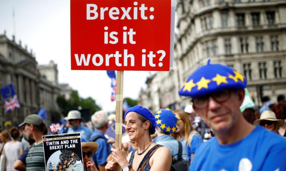 FILE PHOTO: A woman holds a placard as she joins EU supporters, calling on the government to give Britons a vote on the final Brexit deal, participating in the ‘People’s Vote’ march in central London, Britain June 23, 2018. REUTERS/Henry Nicholls -/File Photo