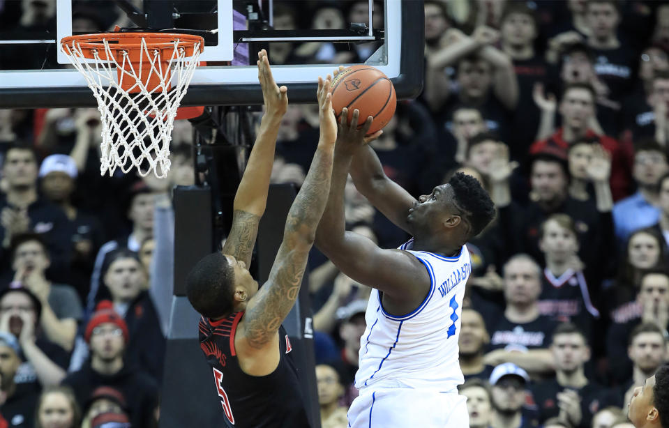 Zion Williamson goes up for a layup against Louisville on Tuesday in the YUM Center. (AP)