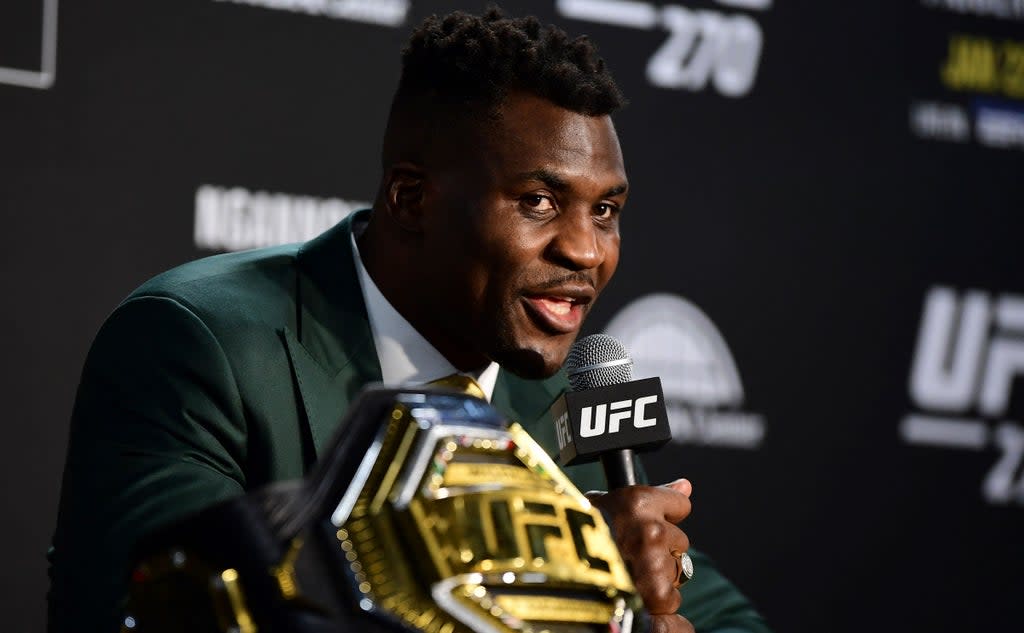 Francis Ngannou takes questions after beating Cyril Gane at UFC 270 (AFP)