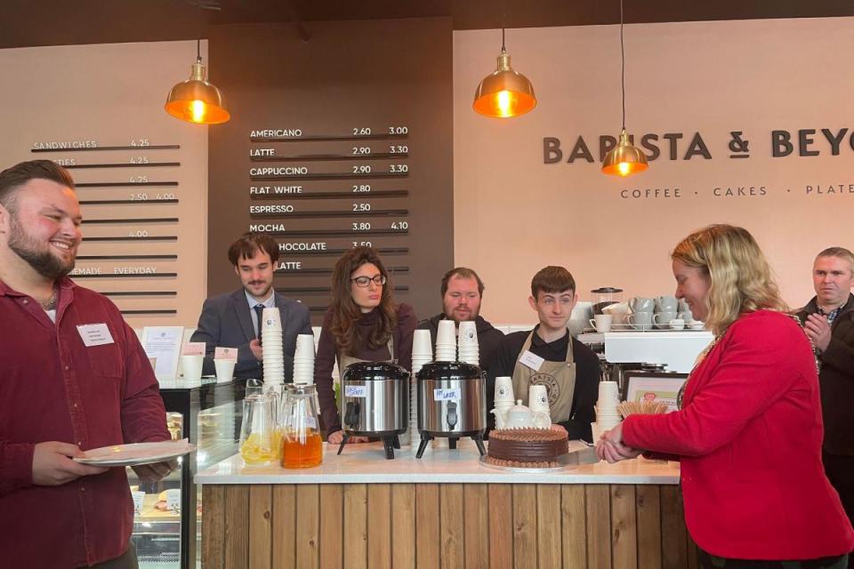 Sebastian Lont, Barista and Beyond Manager (far left), Mayor of Reading Cllr Rachel Eden (far right) with Barista and Beyond staff <i>(Image: Megan O'Neill)</i>