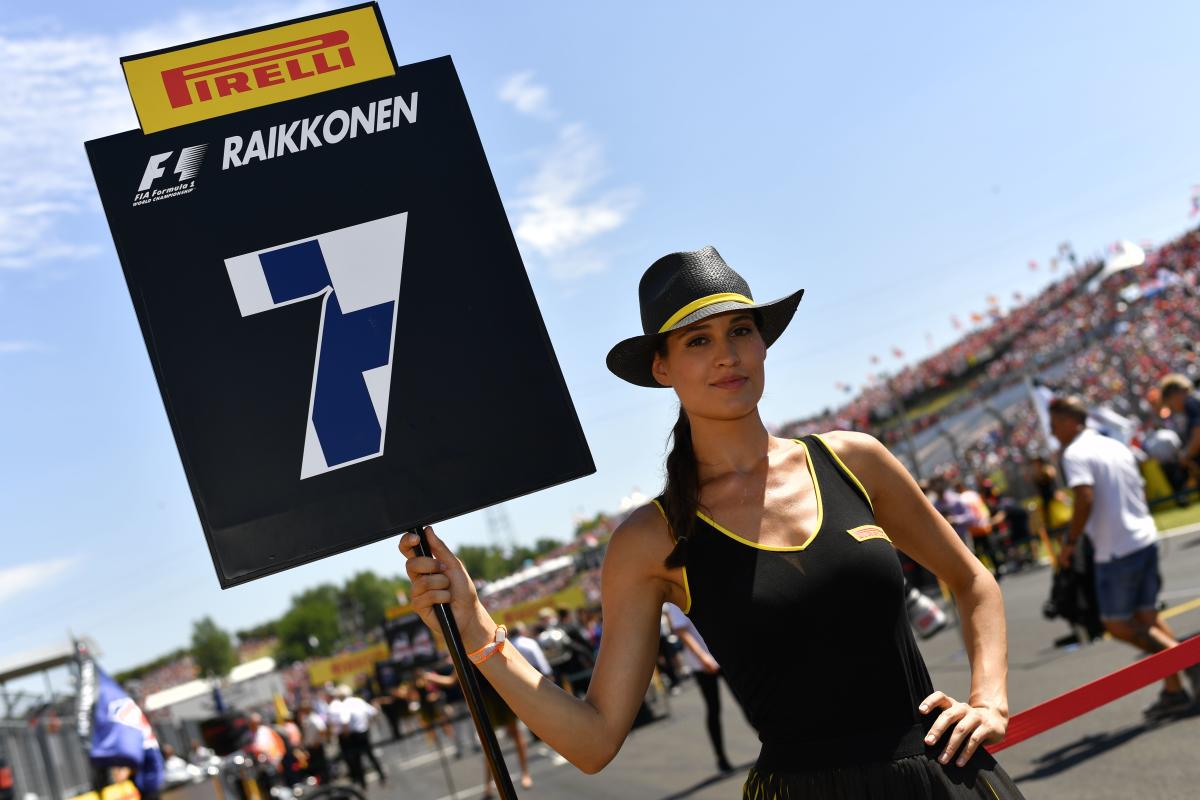 Spanish GP grid girls writhed over car in thongs & tank tops