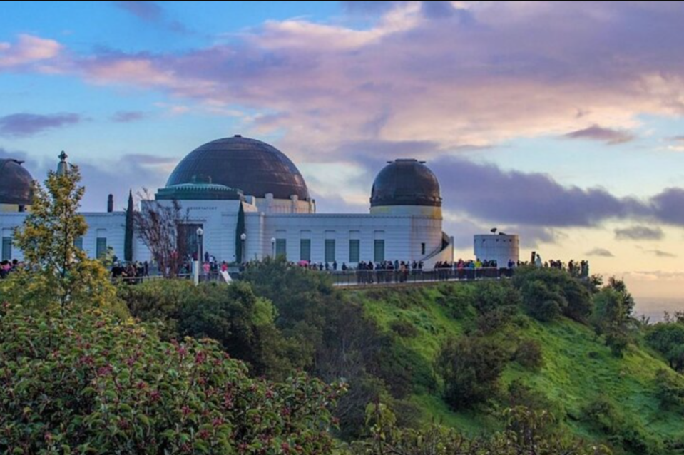 exterior view of people overlooking the hillside at the Griffith Observatory in Los Angeles California