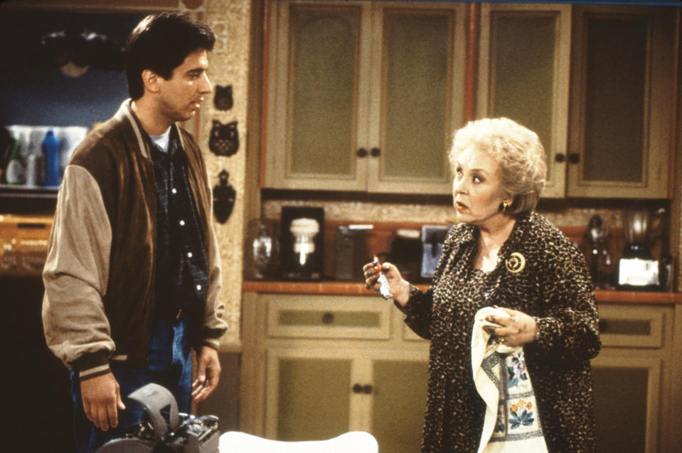 Ray Romano talks to Doris Roberts in the kitchen