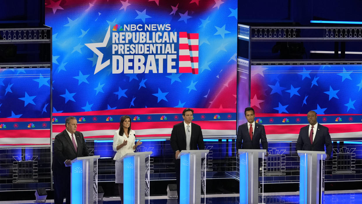 Republican presidential candidates from left, former New Jersey Gov. Chris Christie, former UN Ambassador Nikki Haley, Florida Gov. Ron DeSantis, businessman Vivek Ramaswamy and Sen. Tim Scott, R-S.C., participate in a Republican presidential primary debate hosted by NBC News Wednesday, Nov. 8, 2023, at the Adrienne Arsht Center for the Performing Arts of Miami-Dade County in Miami. (AP Photo/Rebecca Blackwell)