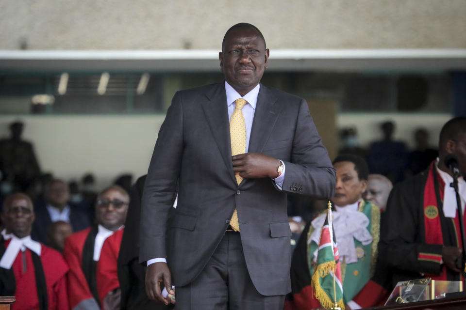 FILE - Kenya's new president William Ruto arrives to be sworn into office at a ceremony held at Kasarani stadium in Nairobi, Kenya Tuesday, Sept. 13, 2022. With every new economic policy by President William Ruto's administration, some Kenyans say that electing him has come back to haunt them.(AP Photo/Brian Inganga, File)