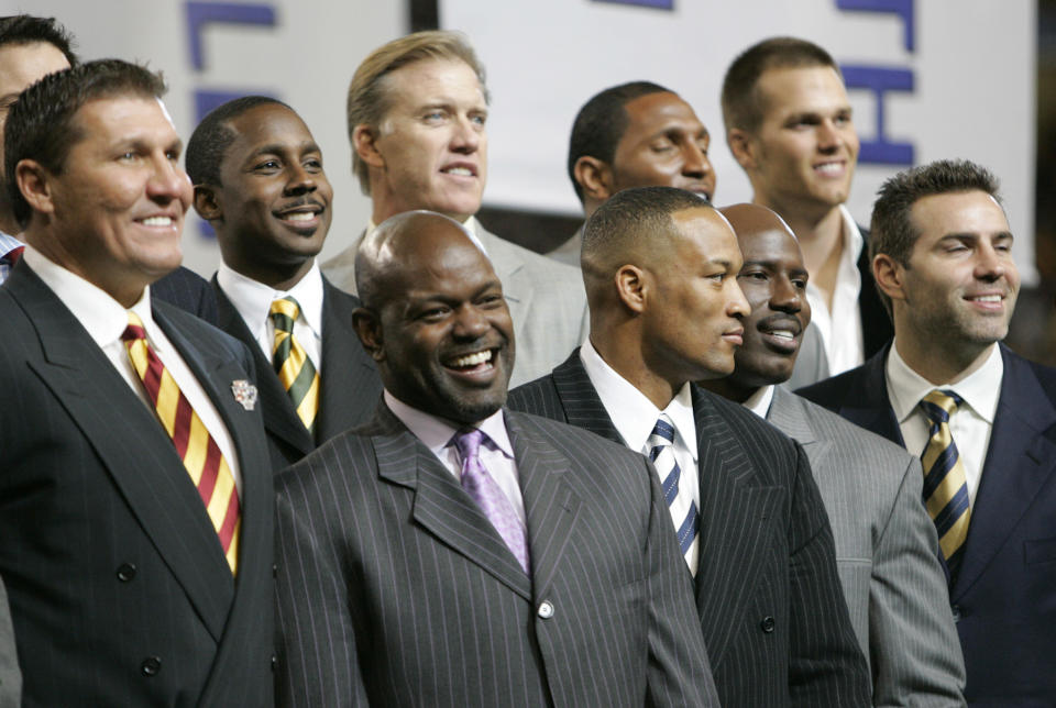 In 2006 the NFL honored former Super Bowl MVPs, going clockwise starting from left: Mark Rypien, Desmond Howard, John Elway, Ray Lewis, Tom Brady, Kurt Warner, Terrell Davis, Larry Brown and Emmitt Smith. (AP)