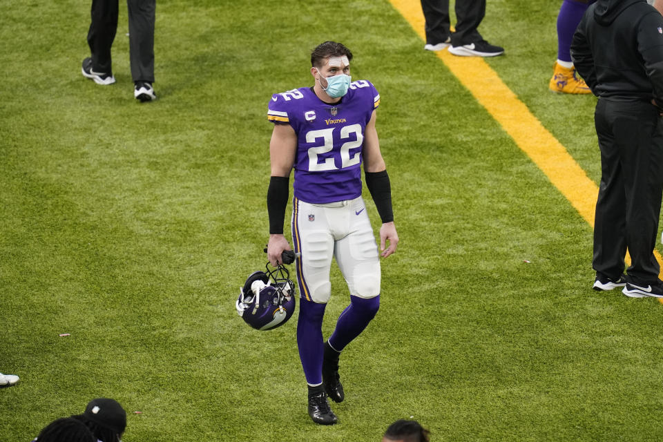 Minnesota Vikings safety Harrison Smith walks on the sideline during the second half of an NFL football game against the Chicago Bears, Sunday, Dec. 20, 2020, in Minneapolis. The Bears won 33-27. (AP Photo/Charlie Neibergall)