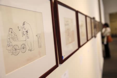 An untitled drawing by John Lennon is seen during the press preview of a collection of Lennon's original drawings and manuscripts from 1964-65 at Sotheby's auction house in New York May 29, 2014. REUTERS/Shannon Stapleton