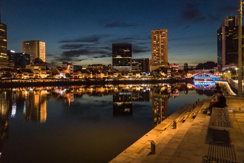 Boat Quay stands deserted at night during the 