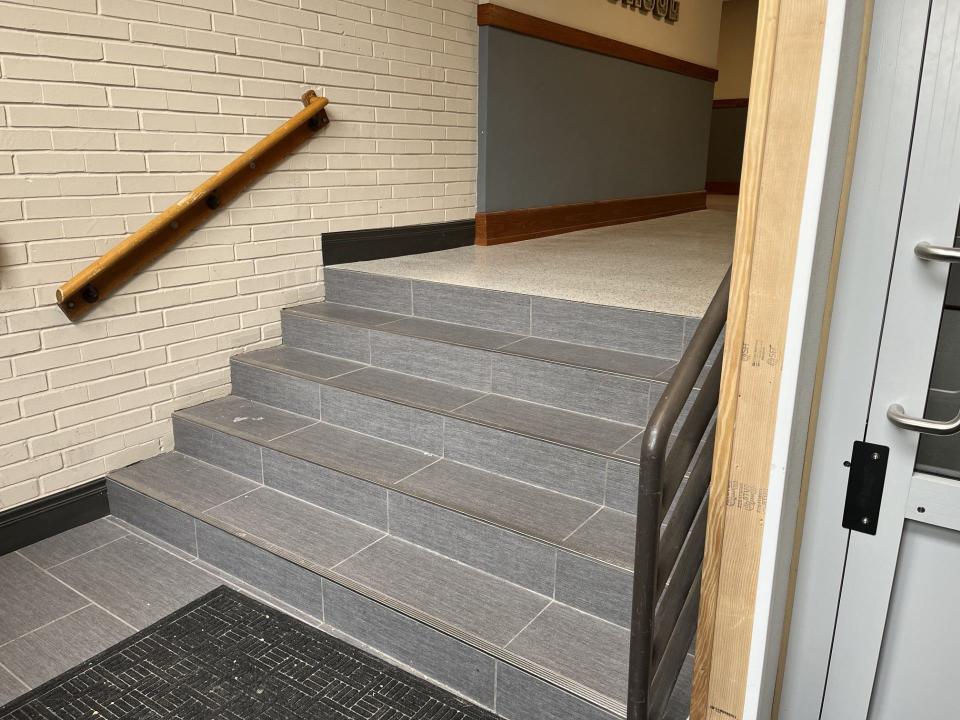 Five steps are located inside the ADA accessible entrance at the Washington School Apartments, next to a new wheelchair lift, as seen, Tuesday, May 14 in Sheboygan, Wis.