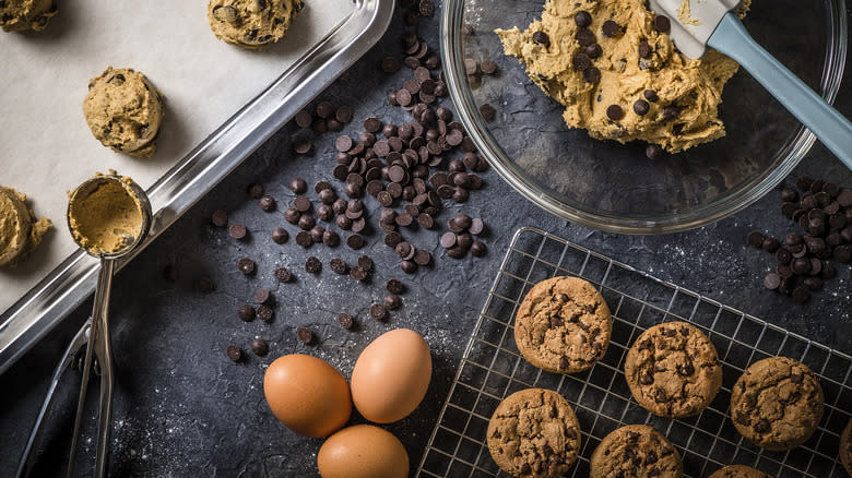Cookies and cookie dough next to eggs 