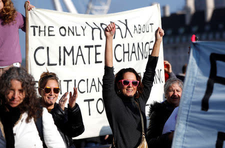 Environmental campaigners from the direct action group Rebellion demonstrate on Westminster Bridge in central London, Britain, November 17, 2018. REUTERS/Peter Nicholls