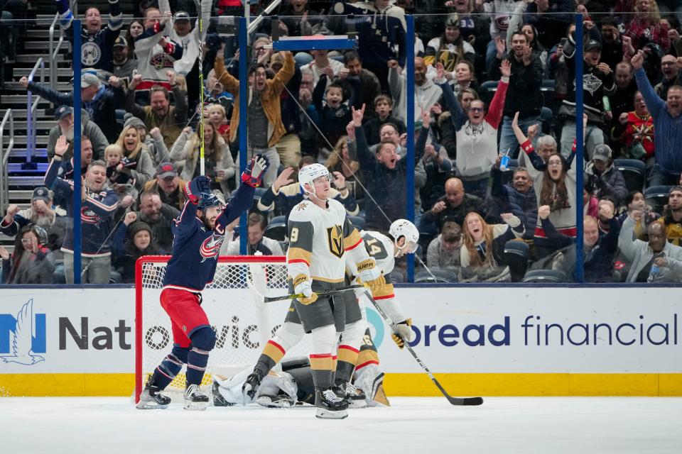 Nov 28, 2022; Columbus, Ohio, USA;  Columbus Blue Jackets center Boone Jenner (38) celebrates a goal by left wing Johnny Gaudreau during the second period of the NHL hockey game against the Vegas Golden Knights at Nationwide Arena. Mandatory Credit: Adam Cairns-The Columbus Dispatch