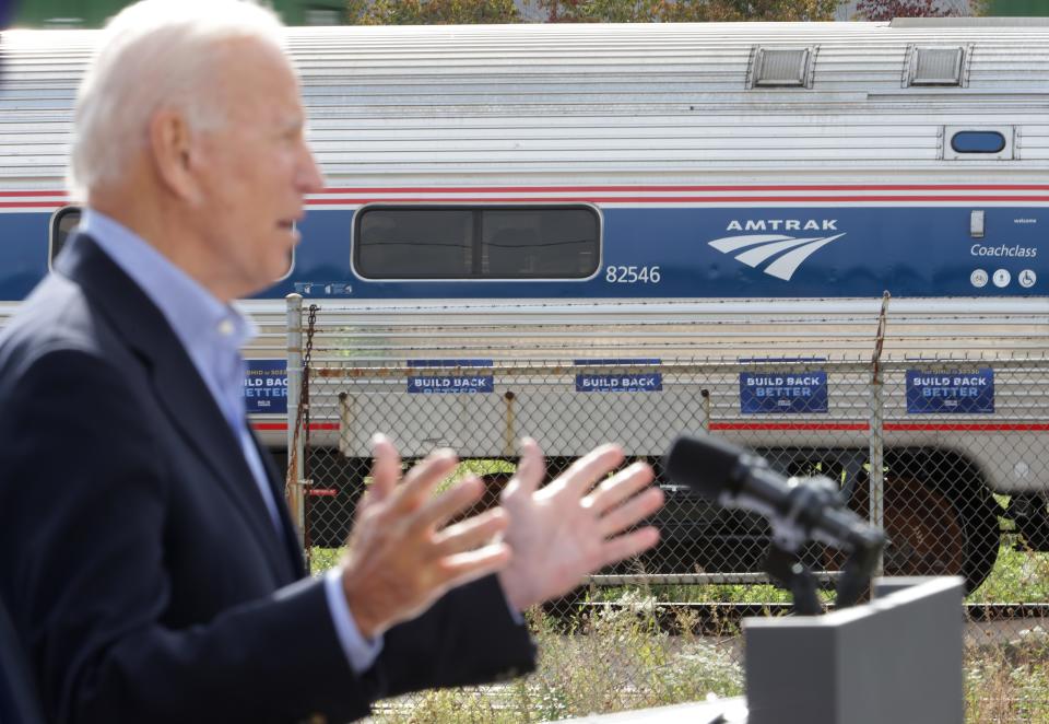 Democratic presidential nominee Joe Biden kicks off a campaign tour by train Wednesday at the Amtrak station in Cleveland.