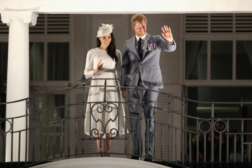 <p><strong>23 October </strong>The royals waved from the balcony of the Grand Pacific Hotel in Suva, <a rel="nofollow noopener" href="https://www.harpersbazaar.com/uk/celebrities/news/a24095376/harry-meghan-queen-prince-philip-fiji/" target="_blank" data-ylk="slk:recreating a moment staged by the Queen and Prince Philip in 1954;elm:context_link;itc:0;sec:content-canvas" class="link ">recreating a moment staged by the Queen and Prince Philip in 1954</a>. </p>