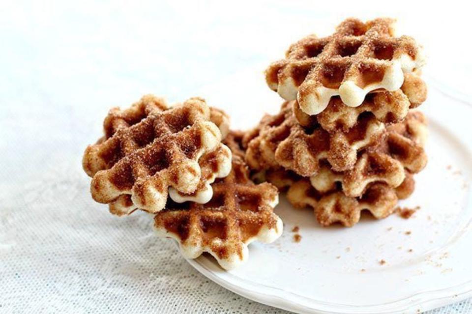 <p>The Kitchen Magpie</p><p>You don't have to wait to go to the county fair to get your mini doughnuts! These Mini Doughnut Waffles recipe is are slightly altered so you can enjoy the flavor but make them quickly in a waffle pan!</p><p><strong>Get The Recipe: <a href="https://www.thekitchenmagpie.com/mini-waffle-donuts/" rel="nofollow noopener" target="_blank" data-ylk="slk:Mini Doughnut Waffles;elm:context_link;itc:0;sec:content-canvas" class="link ">Mini Doughnut Waffles</a></strong></p>
