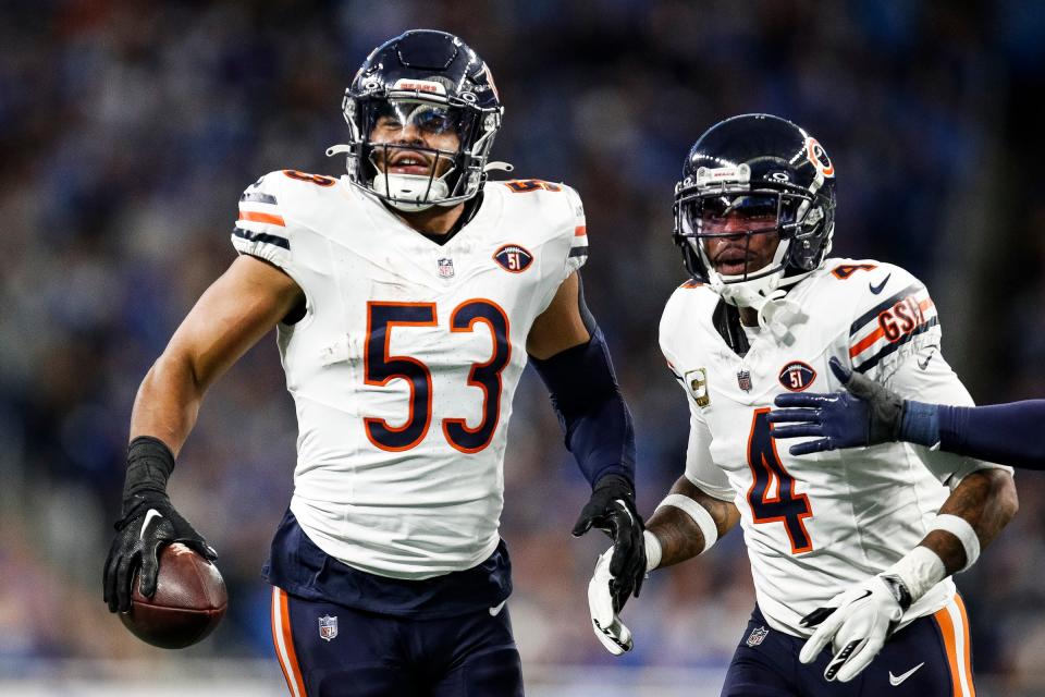 Chicago Bears linebacker T.J. Edwards celebrates an interception against <a class="link " href="https://sports.yahoo.com/nfl/teams/detroit/" data-i13n="sec:content-canvas;subsec:anchor_text;elm:context_link" data-ylk="slk:Detroit Lions;sec:content-canvas;subsec:anchor_text;elm:context_link;itc:0">Detroit Lions</a> quarterback <a class="link " href="https://sports.yahoo.com/nfl/players/29235" data-i13n="sec:content-canvas;subsec:anchor_text;elm:context_link" data-ylk="slk:Jared Goff;sec:content-canvas;subsec:anchor_text;elm:context_link;itc:0">Jared Goff</a> during the first half at Ford Field in Detroit on Sunday, Nov. 19, 2023.